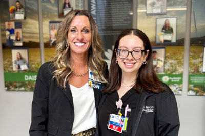 Emma and Julie receiving fellowship program