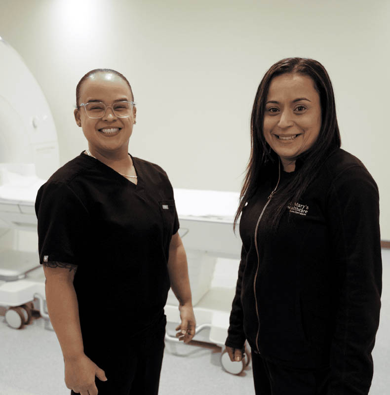 2 nurses smiling